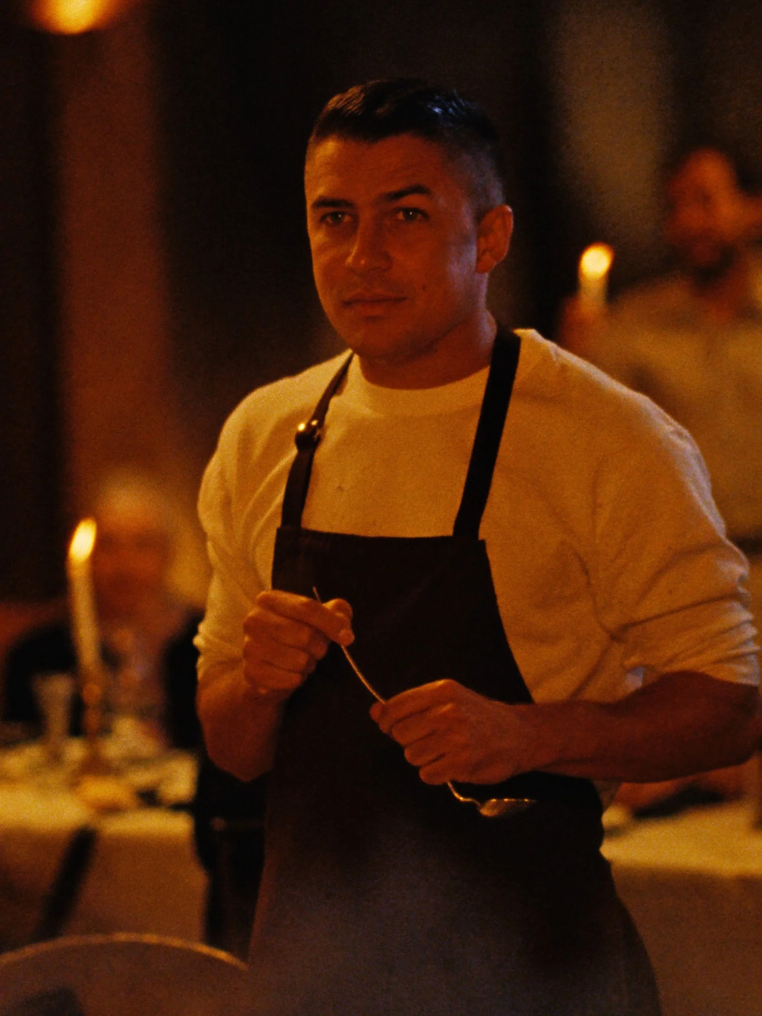 The mixologist behind the bar